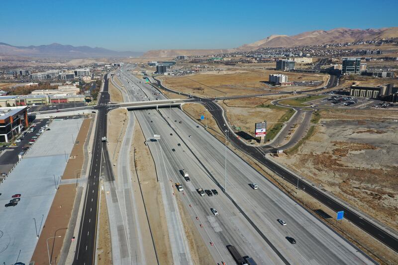 Vehicles travel on I-15 in northern Utah County.