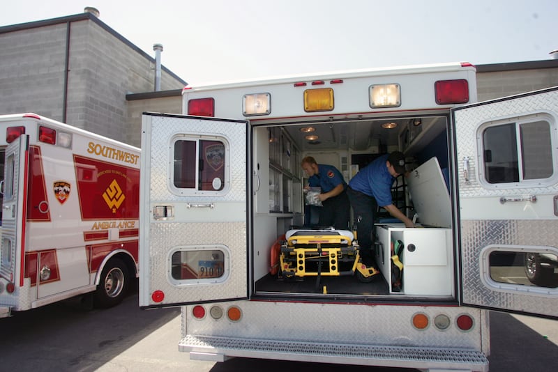 Jake Rigby and Ryan Babinsky check inventory in Southwest Ambulance’s new bariatric ambulances in West Valley City.