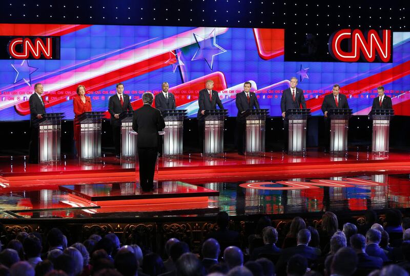 Republican presidential candidates, from left, John Kasich, Carly Fiorina, Marco Rubio, Ben Carson, Donald Trump, Ted Cruz, Jeb Bush, Chris Christie, and Rand Paul share the stage with debate moderator Wolf Blitzer during the CNN Republican presidential d