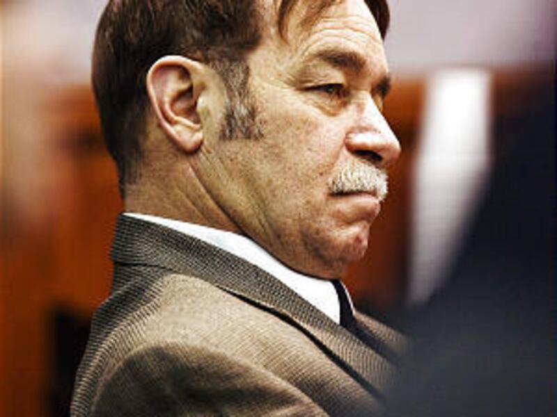 Edward Owens, accused of murdering Karin Strom, listens to the prosecution during opening statements Tuesday in Farmington.