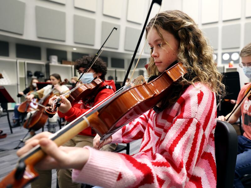 Emily Richards and other orchestra students rehearse at Alta High School in Sandy on Friday, Jan. 21, 2022.