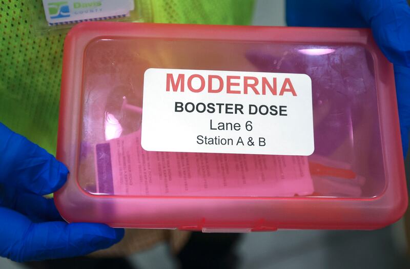 A box of Moderna COVID-19 vaccine booster doses.