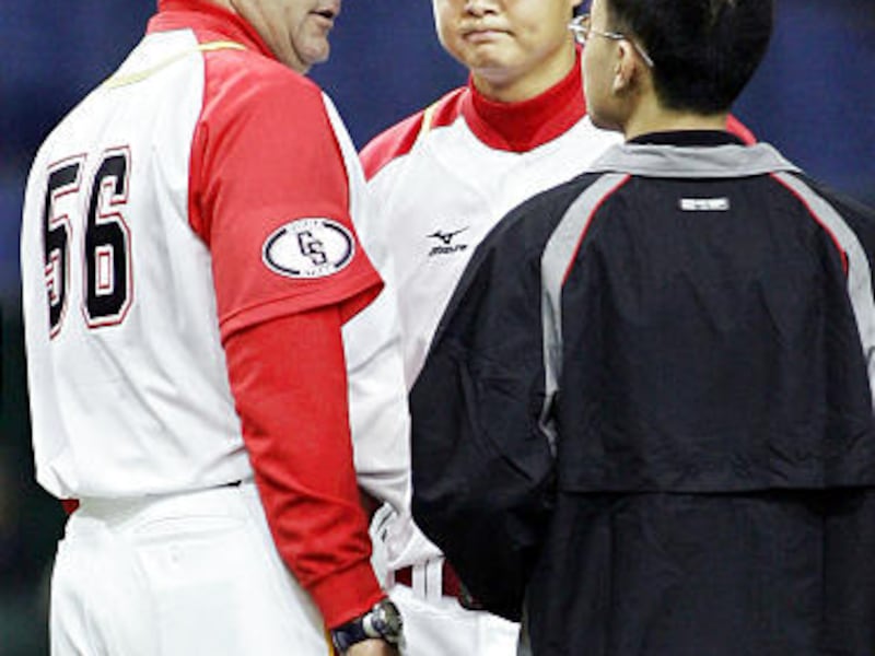 Utah native Bruce Hurst, left, served as the Chinese national baseball team's pitching coach from 2003-07.