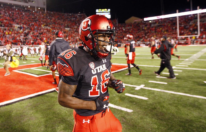 Utah cornerback Cory Butler-Byrd (16) celebrates after catching an interception to end the game in a Pac-12 football game against the Arizona State Sun Devils at Rice-Eccles Stadium in Salt Lake City, Saturday, Oct. 17, 2015.