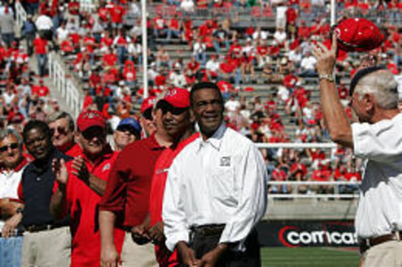 Members of Utah's 1964 Liberty Bowl team were honored at halftime of the Utes' homecoming game on Sept. 25, 2004. Utah defeated West Virginia, 32-6, in the game played in Atlantic City.