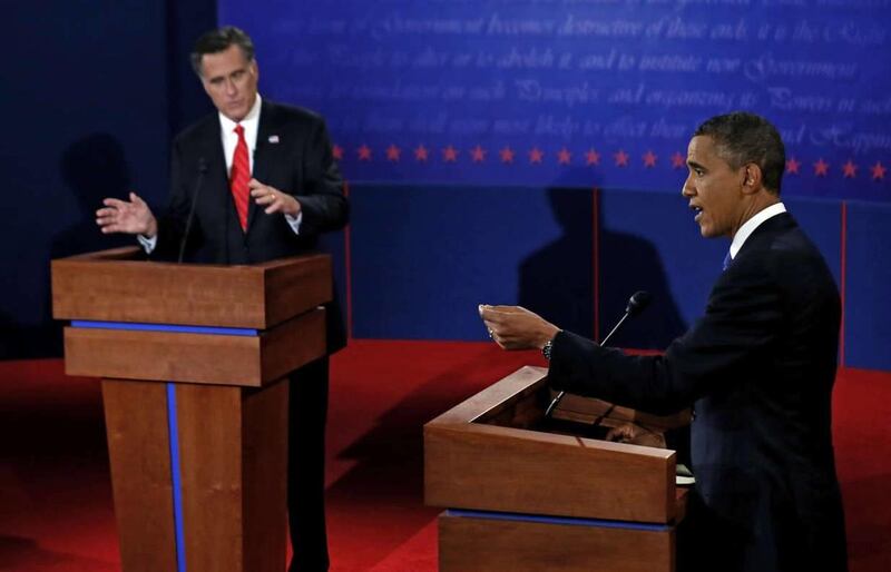 President Barack Obama and Republican presidential nominee Mitt Romney participate in the first presidential debate at the University of Denver, Wednesday, Oct. 3, 2012, in Denver. (AP Photo/Pool, Rick Wilking)