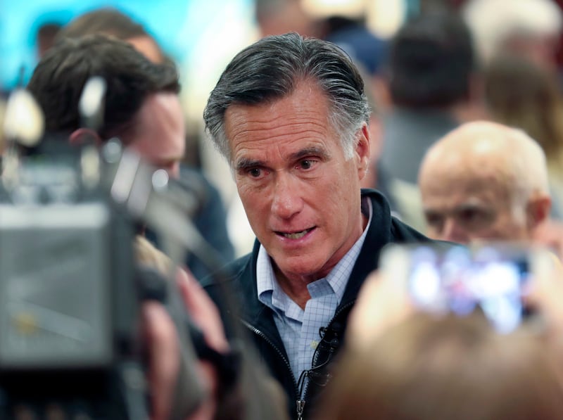 U.S. Senator Mitt Romney, R-Utah, speaks with audience members following his first town hall meeting in Farmington on Tuesday, Jan. 22, 2019.