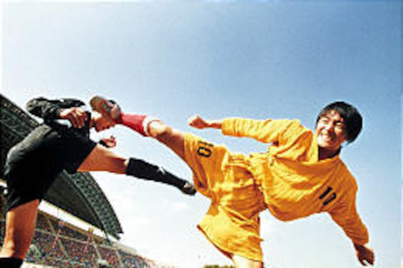 Stephen Chow plays for an underdog soccer team that uses the martial arts of the Shaolin monks to defeat opponents in "Shaolin Soccer."