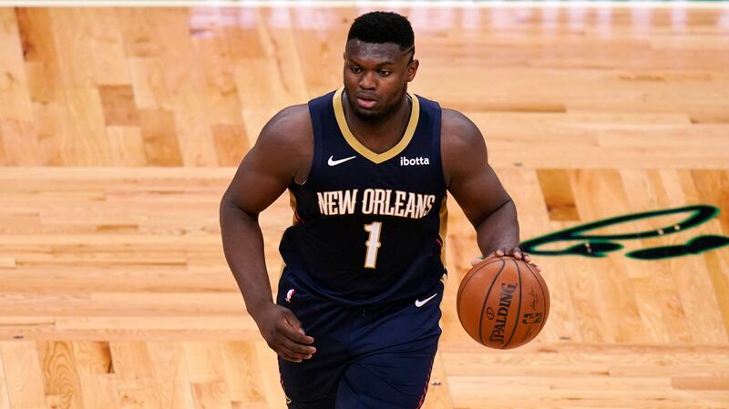 New Orleans Pelicans forward Zion Williamson (1) dribbles during the second half of an NBA basketball game, Monday, March 29, 2021, in Boston.
