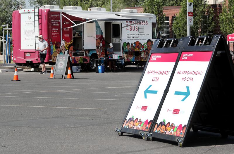 The University of Utah Wellness Bus and staff conduct COVID-19 testing at the Central Park Community Center in South Salt Lake on Tuesday, Aug. 11, 2020.