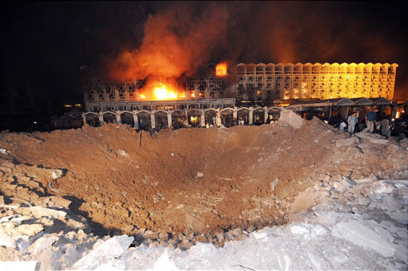 A bomb blast that killed at least 38 people left a huge crater outside the burning facade of the Marriott Hotel in Islamabad, Pakistan, Saturday. The targeting of the American hotel chain is one of the largest terrorist attacks ever in Pakistan.