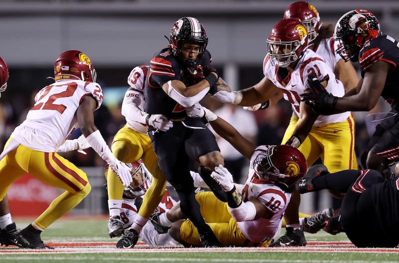 Utah running back Micah Bernard breaks tackles during game against USC in Salt Lake City, Oct. 15, 2022.