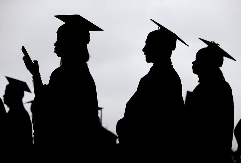 Graduates line up before the start of the Bergen Community College commencement at MetLife Stadium in East Rutherford, N.J.