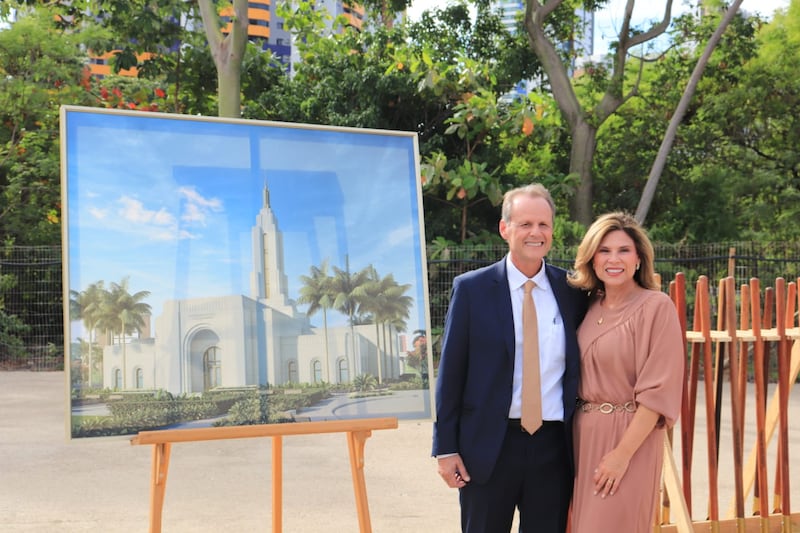 Elder Joni L. Koch and Sister Liliane Koch stand by a rendering of the João Pessoa Brazil Temple on the day of its groundbreaking, Jan. 24, 2026, in João Pessoa, Brazil.