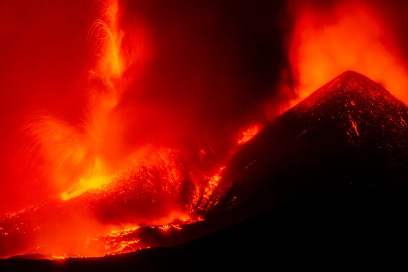Lava flows from the Mount Etna volcano as seen from Southeast Crater, in Nicolosi, Sicily.