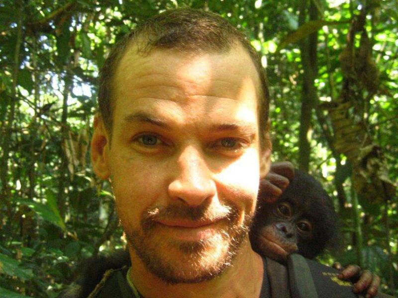 This undated photo supplied by Fluidkayaks shows South African Kayaker, Hendri Coetzee, posing with a monkey on his shoulder. Coetzee, who was leading two Americans on a whitewater expedition in Central Africa is presumed dead after a crocodile attacked t