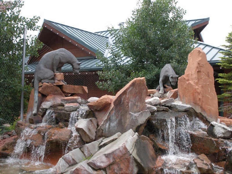 The bronze cougars near Hogle Zoo's front gate were created by Avard Fairbanks.