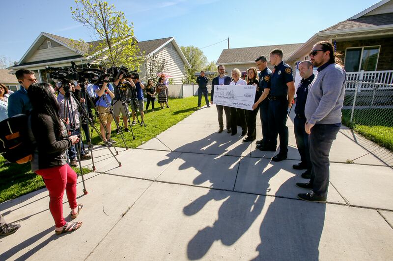 Salt Lake City Mayor Jackie Biskupski joins representatives from the Community Development Corporation of Utah to formally launch the Community Heroes Home Buyer Program in Salt Lake City on Thursday, April 25, 2019. The down-payment assistance program is