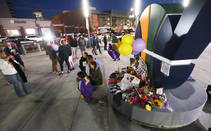 Basketball fans pay tribute to Kobe Bryant outside Vivint Arena in Salt Lake City on Monday, Jan. 27, 2020.