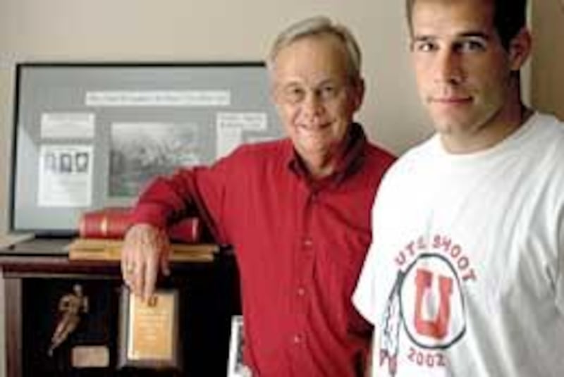 Morgan Scalley, right, is following in the footsteps of his dad, Bud, as a member of the University of Utah football team. The Utes play Utah State Saturday.