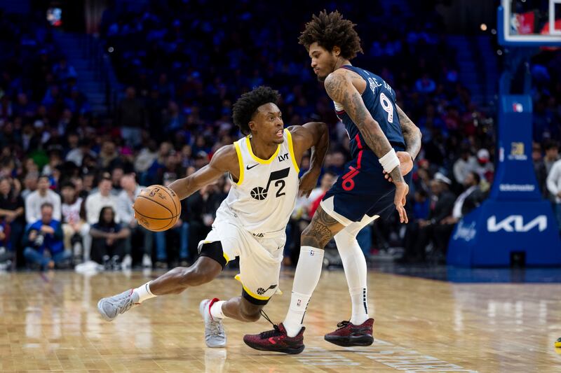 Utah Jazz’s Collin Sexton, left, drives against Philadelphia 76ers’ Kelly Oubre Jr. during the second half of an NBA basketball game Saturday, Jan. 6, 2024, in Philadelphia. The Jazz won 120-109. (AP Photo/Chris Szagola)