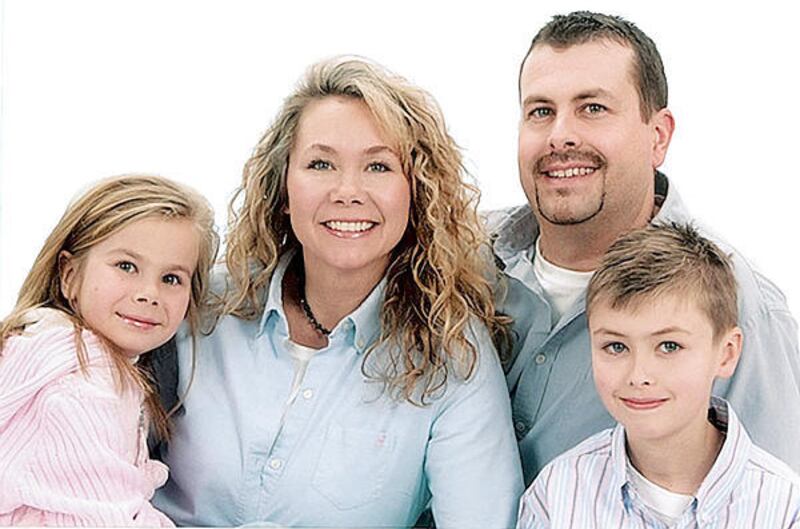 Lexie, left, and Cory learned a simple peacekeeping trick from parents Virginia and Troy Pinkston.