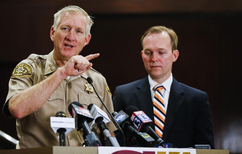 FILE "“ Salt Lake County Sheriff Jim Winder, left, speaks to members of the media as Salt Lake County Mayor Ben McAdams looks on at Salt Lake County Government Center in Salt Lake City on Monday, May 1, 2017.