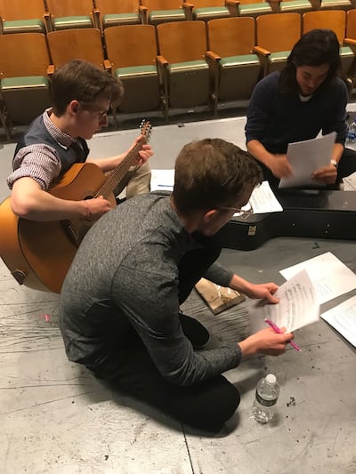 Musical Theater Songwriting Challenge finalist Braxton Carr, left, rehearses with one of his mentors Ty Defoe, right, and music director Patrick Sulken, front, while preparing the song he co-wrote with Eliza Corrington, “Ten Seconds to Infinity.”