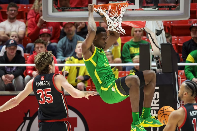 Oregon Ducks center N’Faly Dante (1) dunks during the game against the Utah Utes at the Huntsman Center in Salt Lake City on Saturday, Jan. 7, 2023.