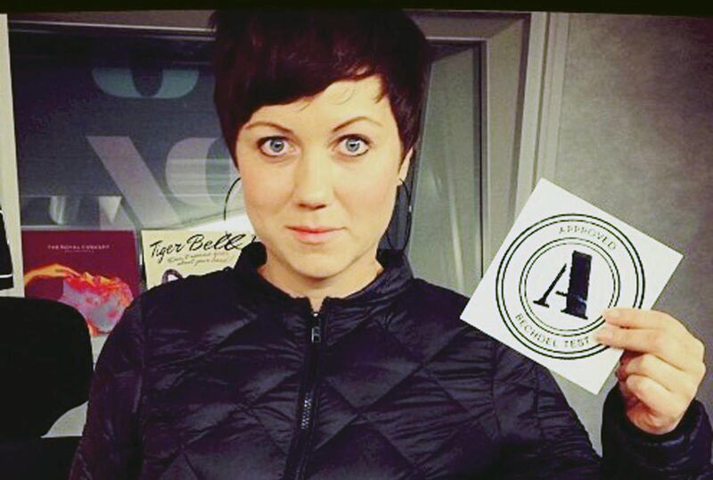 The director of art-house movie theatre Bio Rio in Stockholm, Ellen Tejle holds a Bechdel test approval A certificate, in this photo dated Oct. 19, 2013. Critics are arguing this test of feminism within films has become unfair.