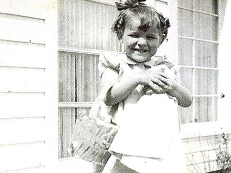 The writer, Jelean Reynolds, as a young girl, prepares to celebrate Easter with family.