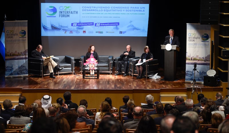 Elder D. Todd Christofferson, right, of the Quorum of the Twelve Apostles of The Church of Jesus Christ of Latter-day Saints, speaks at the G20 Interfaith Forum in Buenos Aires, Argentina, on Sept. 26, 2018.