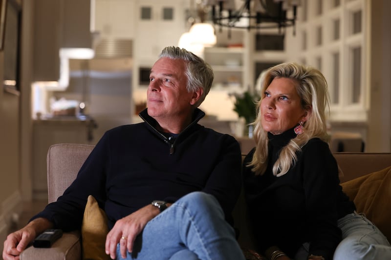Jon Hunstman Jr. and his wife Mary Kaye watch the GOP presidential debate at their Salt Lake City home.