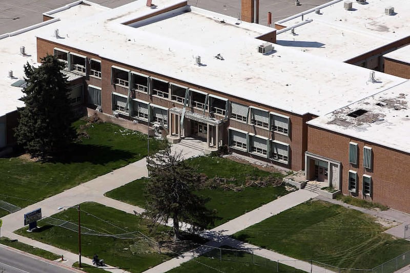 The new Midvale Elementary School stands to benefit from pieces of the old one, seen here and now demolished. People can help build up programs at the new school by buying bricks from the old, now-demolished school on Center Street.