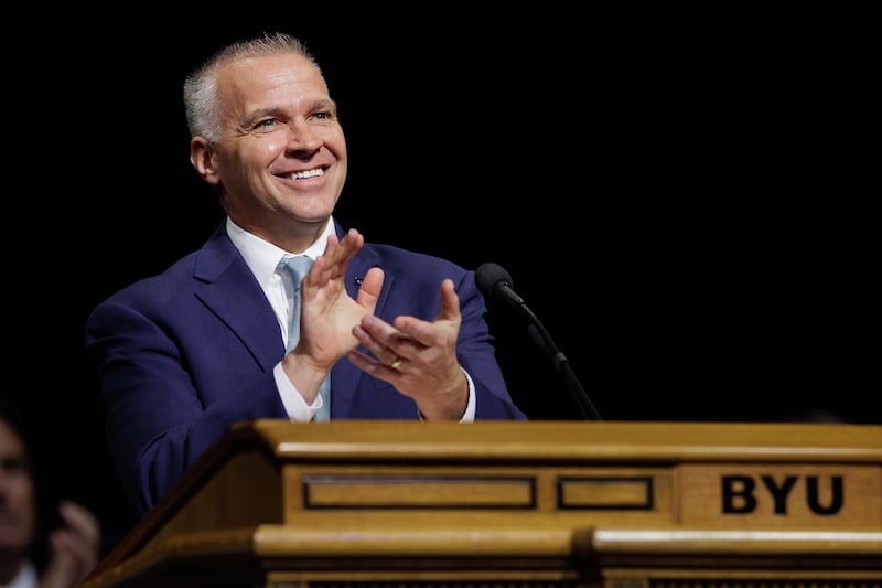 New BYU President Shane Reese applauds winners of annual faculty and staff awards during the 2023 University Conference.