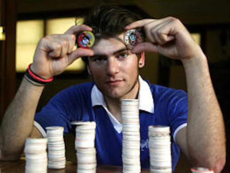 Kirk Dath shows off his pog collection."I wouldn't get rid of them. There's a story behind each one," he says.