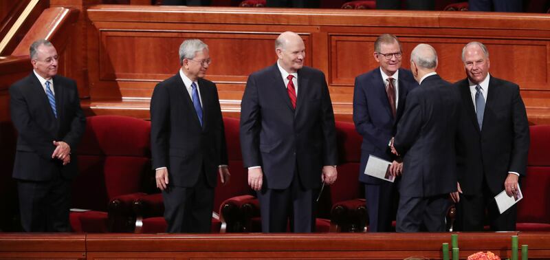 President Russell M. Nelson of The Church of Jesus Christ of Latter-day Saints, greets members of the Quorum of the Twelve Apostles during the 188th Semiannual General Conference of The Church of Jesus Christ of Latter-day Saints in Salt Lake City on Sund