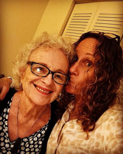 Lisa Sugarman smooches her mom, Sandy Eigner. She says Eigner taught her to cast lots of bread on the water to see what returns.
