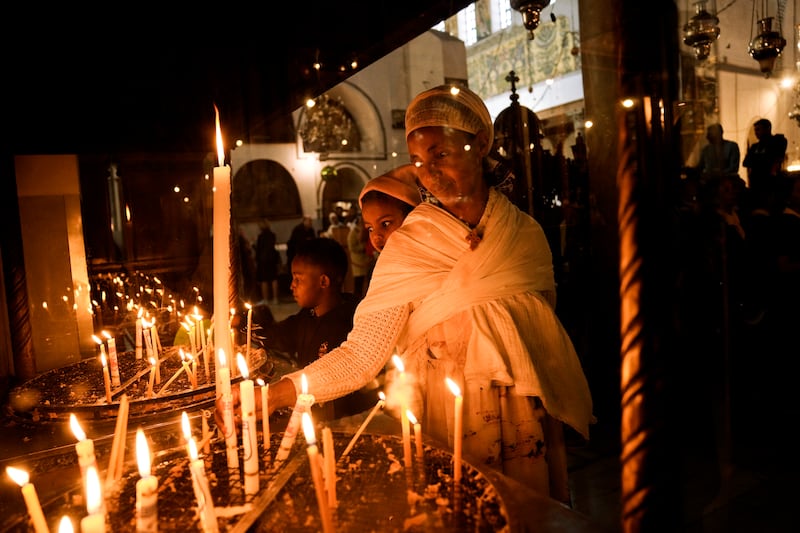 An Ethiopian woman and her child visit the Church of the Nativity.