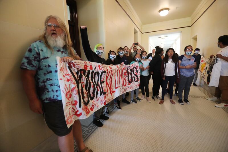 Protesters disrupt a Utah Inland Port Authority board meeting at the Capitol in Salt Lake City on Wednesday, June 5, 2019.