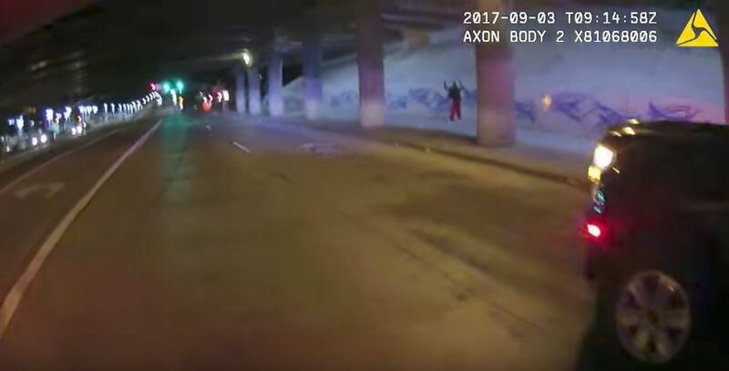 A still from footage of the shooting of a 17-year-old boy by a Cottonwood Heights police officer in September.