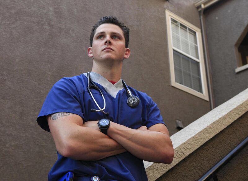 In this photo taken Friday, Sept. 30, 2011, is Tim Brown, 25, emergency room nurse from Jacksonville, Fla, who moved to Sacramento, Calif. with a friend in February to work at a Sacramento hospital as a traveling nurse. Hospitals across the country use