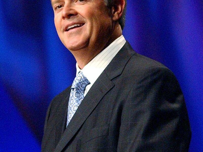 FILE - Truman Hunt, CEO of NuSkin, speaks at the opening ceremonies of the NuSkin Inrernational Convention at the Delta Center on October 6, 2005. The report released Thursday by The Associated Press found that Hunt was the highest-compensated CEO in the