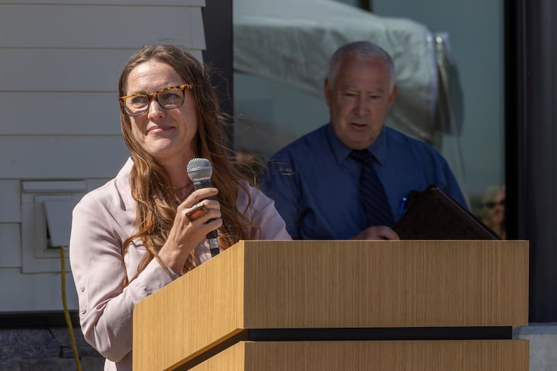 Andrea Lithgow, a child abuse survivor, speaks at the opening of the new Weber-Morgan Children’s Justice Center.