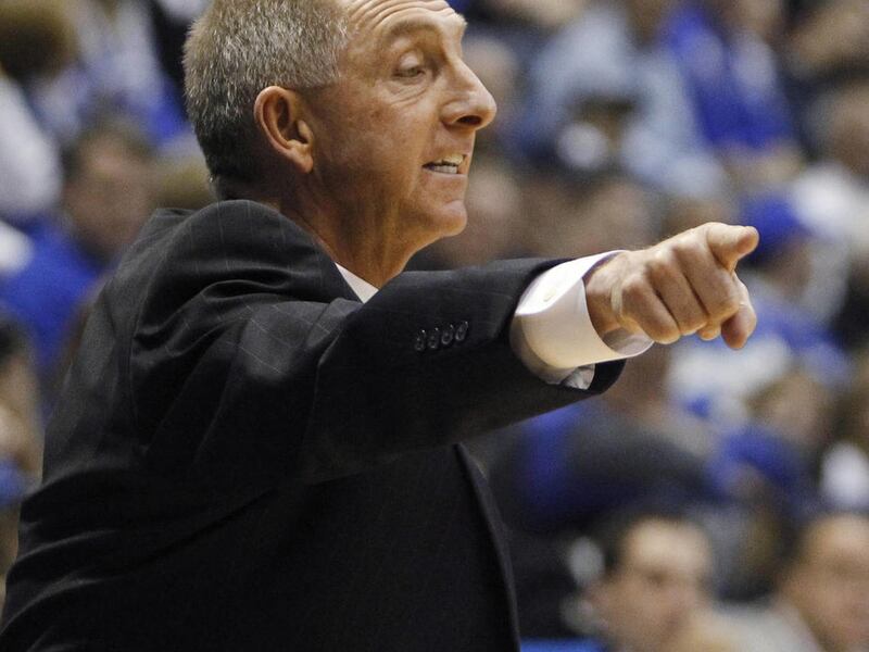 Air Force coach Jeff Reynolds calls a play during the first half of an NCAA college basketball game against BYU at Air Force Academy, Colo., on Wednesday, Feb. 9, 2011.