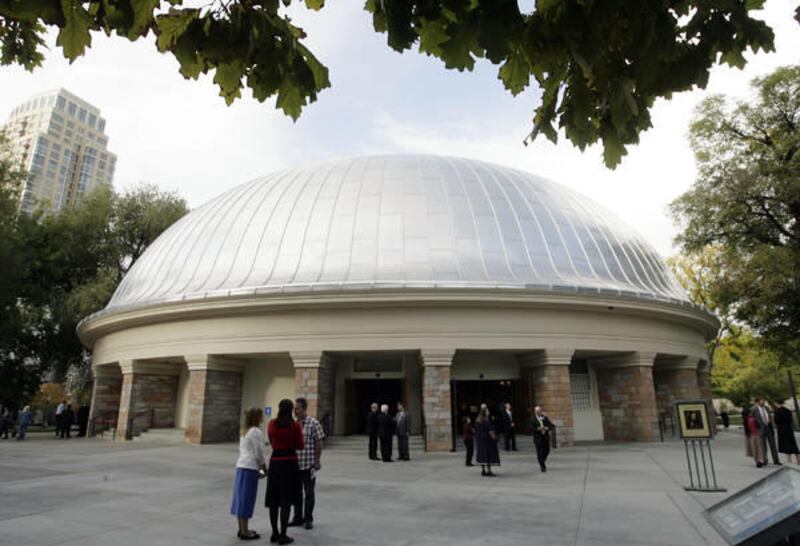 Temple Square visitors walk around the Tabernacle in Salt Lake City Oct. 17, 2010.