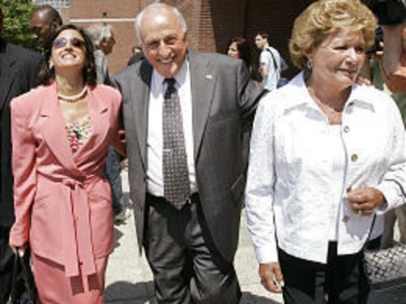 Peter Limone, wife Olympia, right, and attorney Juliane Balliro leave the federal courthouse in Boston on Thursday.