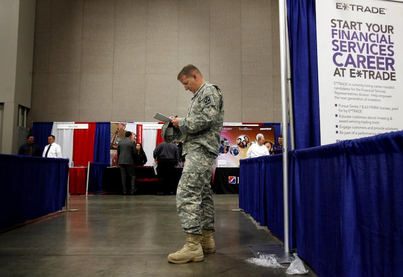 Sgt. Paul Anthony of the Army Reserves attends the "Hiring Our Heroes" Job Fair at the Salt Palace Convention Center in Salt Lake City in this Wednesday, April 17, 2013, file photo.