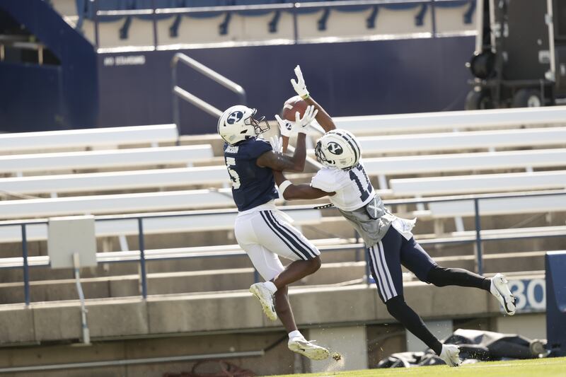 BYU wide receiver Chris Jackson tries to catch pass during fall camp.