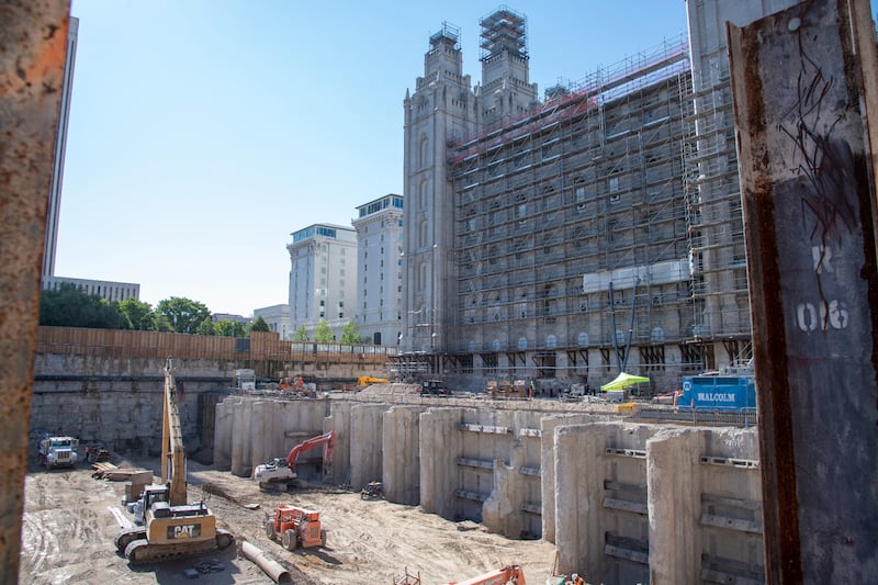 A view of the secant walls and buttresses, which contain soil and hold the foundation of the temple in place, during excavation.